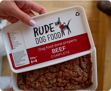open tub of raw complete beef